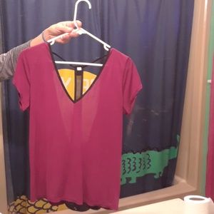 a  shirt  with the back open lace in back